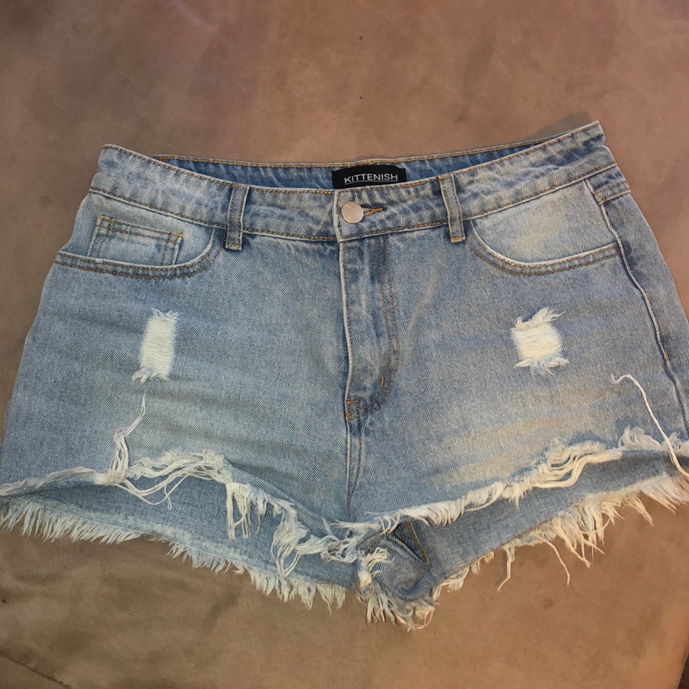 Distressed denim shorts